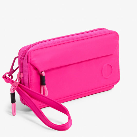 Practice Lissome Wallet Crossbody in Dragonfruit pink color front of wallet wristlet strap