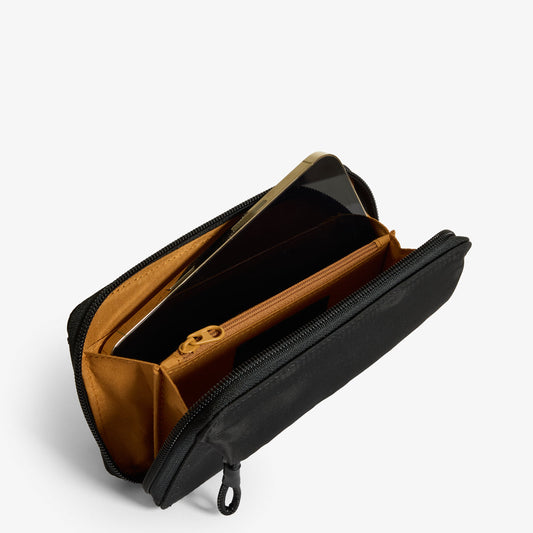 Practice Lissome Wallet Crossbody in Eclipse black color interior of wallet with cellphone tan lining material