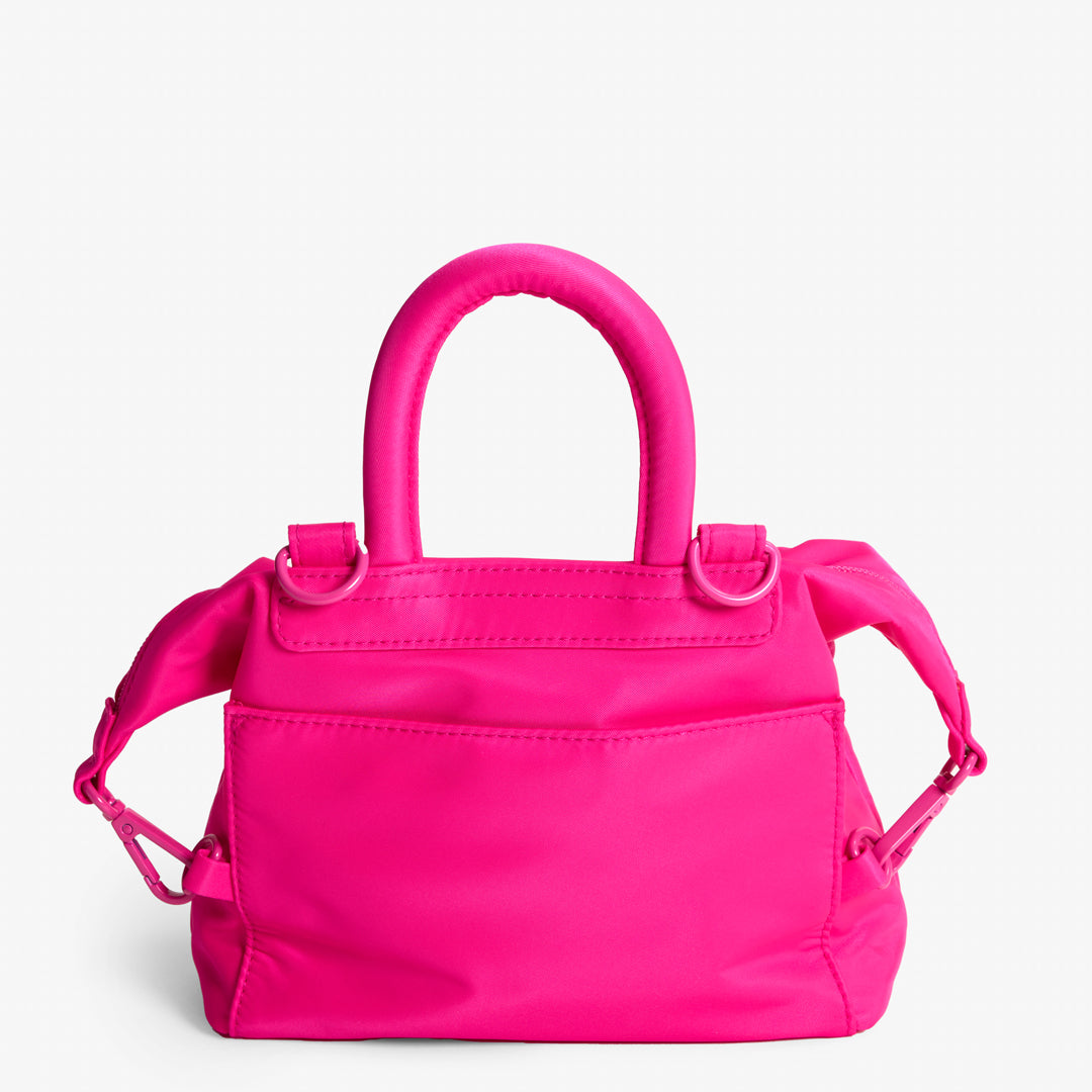 Practice Karma Mini Crossbody bag in Dragonfruit hot pink color back of bag close up