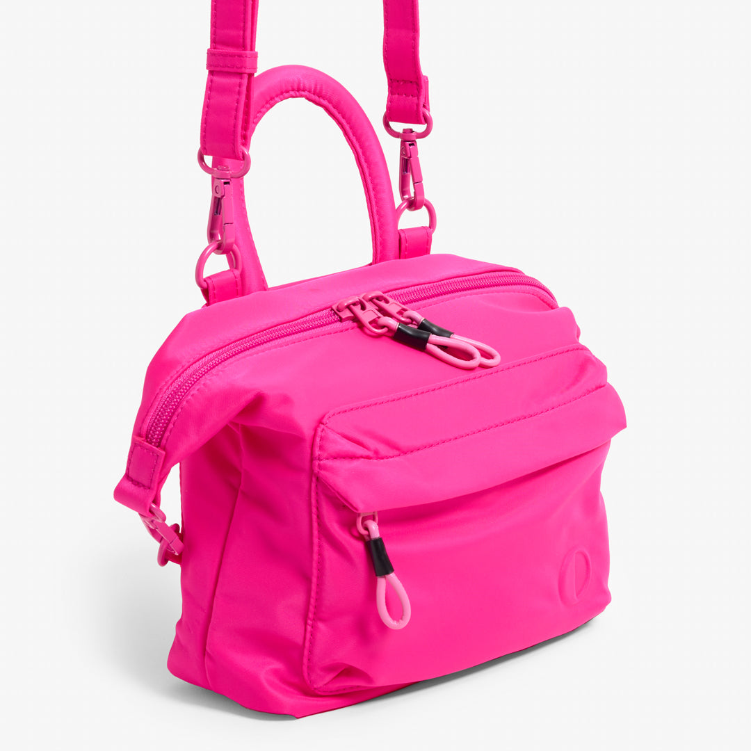 Practice Karma Mini Crossbody bag in Dragonfruit hot pink color side view