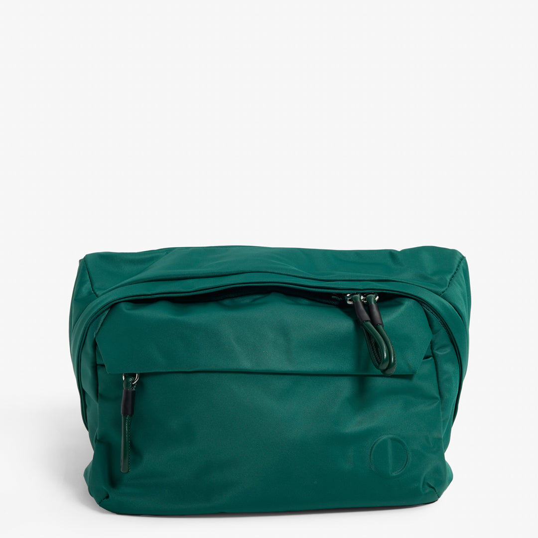 Practice Phase Sling Pack belt bag in Forest green color front of bag close up