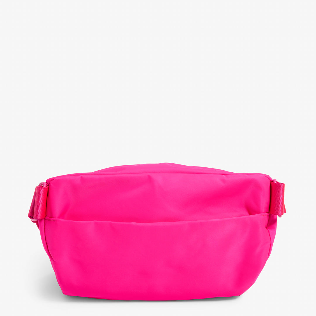 Practice Phase Sling Pack belt bag in Dragonfruit hot pink color back of bag close up