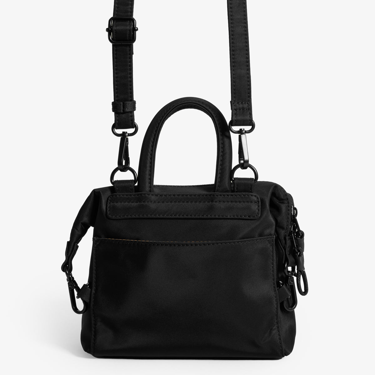 Practice Karma Mini Crossbody bag in Eclipse black color back of bag with crossbody strap extended