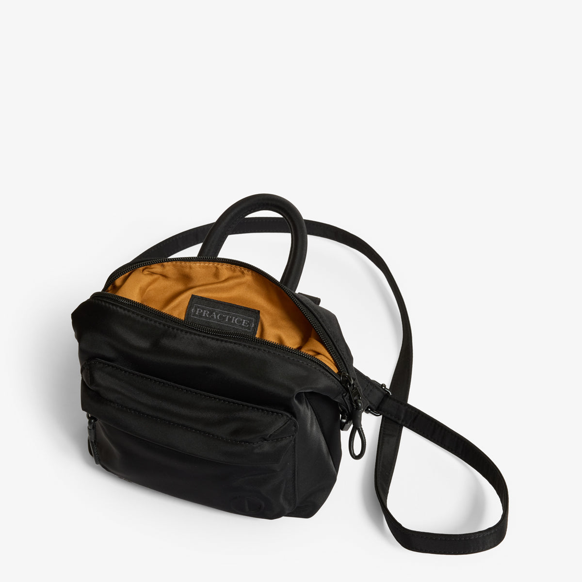 Practice Karma Mini Crossbody bag in Eclipse black color interior shot with crossbody strap