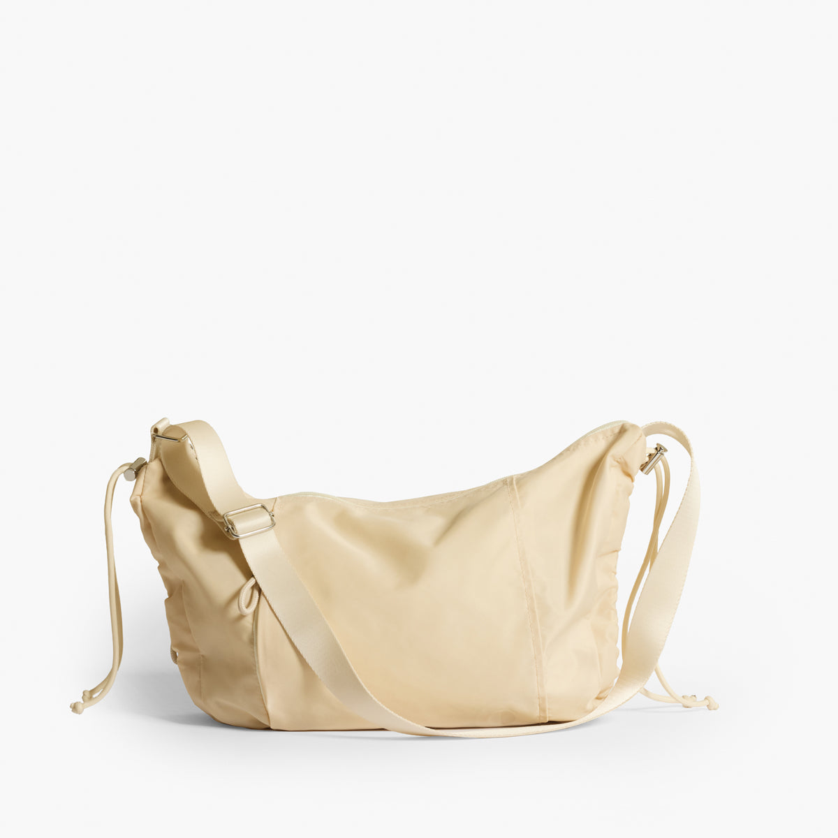Practice Demilune Shoulder Sling bag in Tofu cream color front view