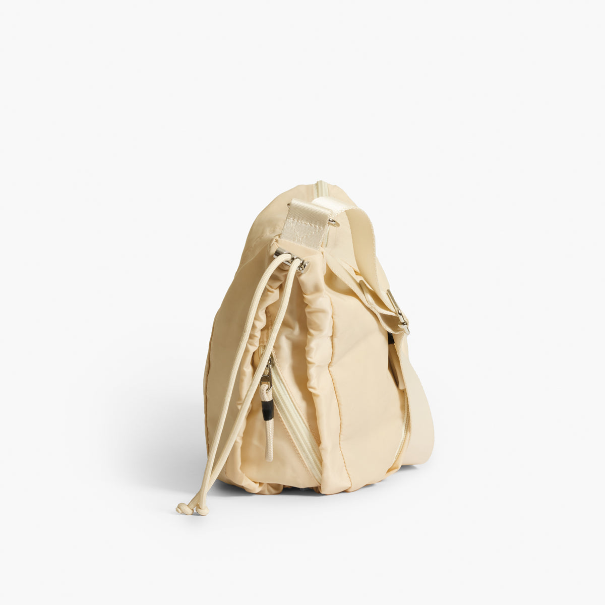 Practice Demilune Shoulder Sling bag in Tofu cream color side view cinch detail