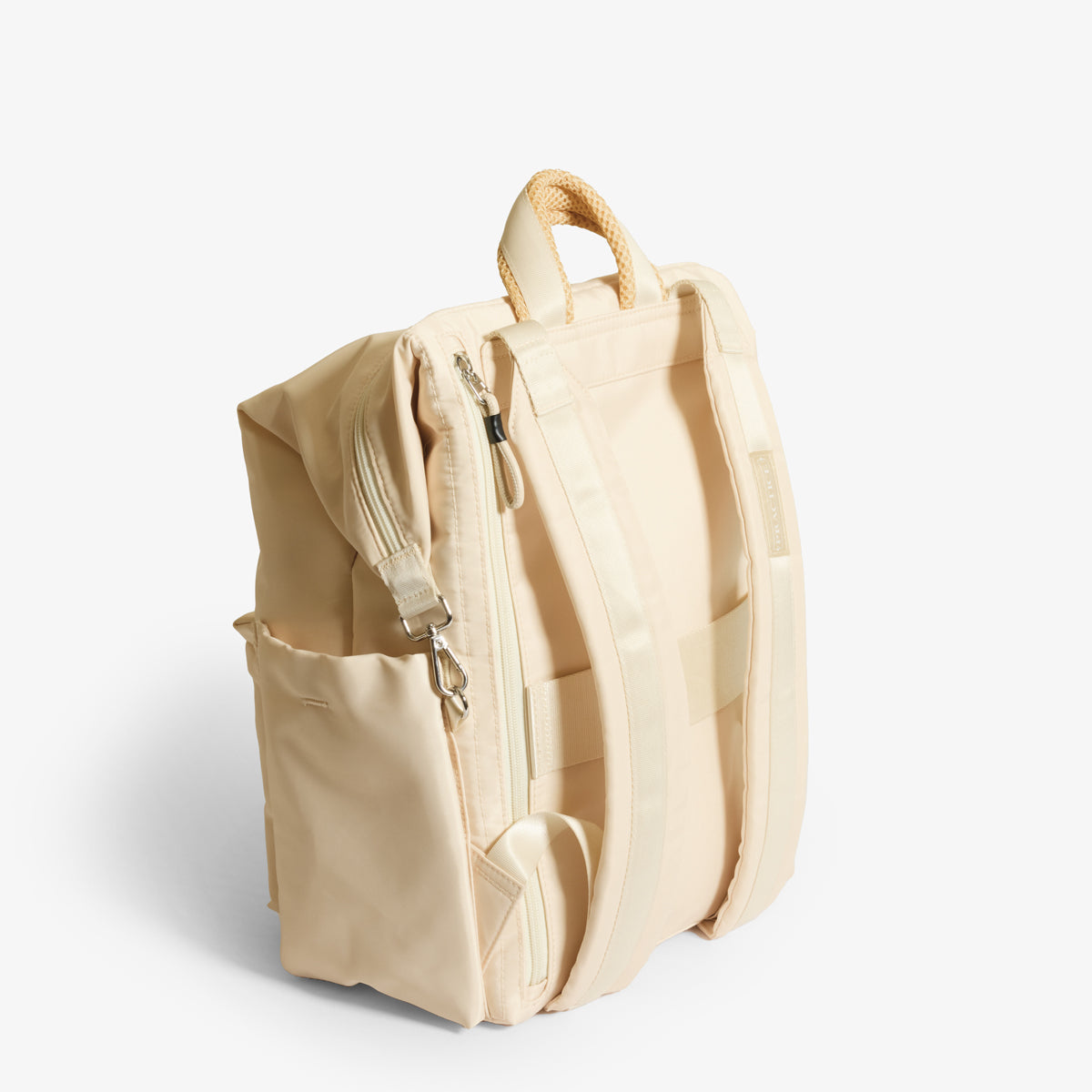 Practice Karma Medium Backpack in Tofu cream color back of bag