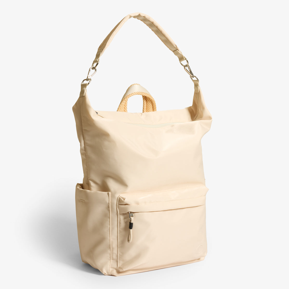 Practice Karma Medium Backpack in Tofu cream color side angle with shoulder strap extended