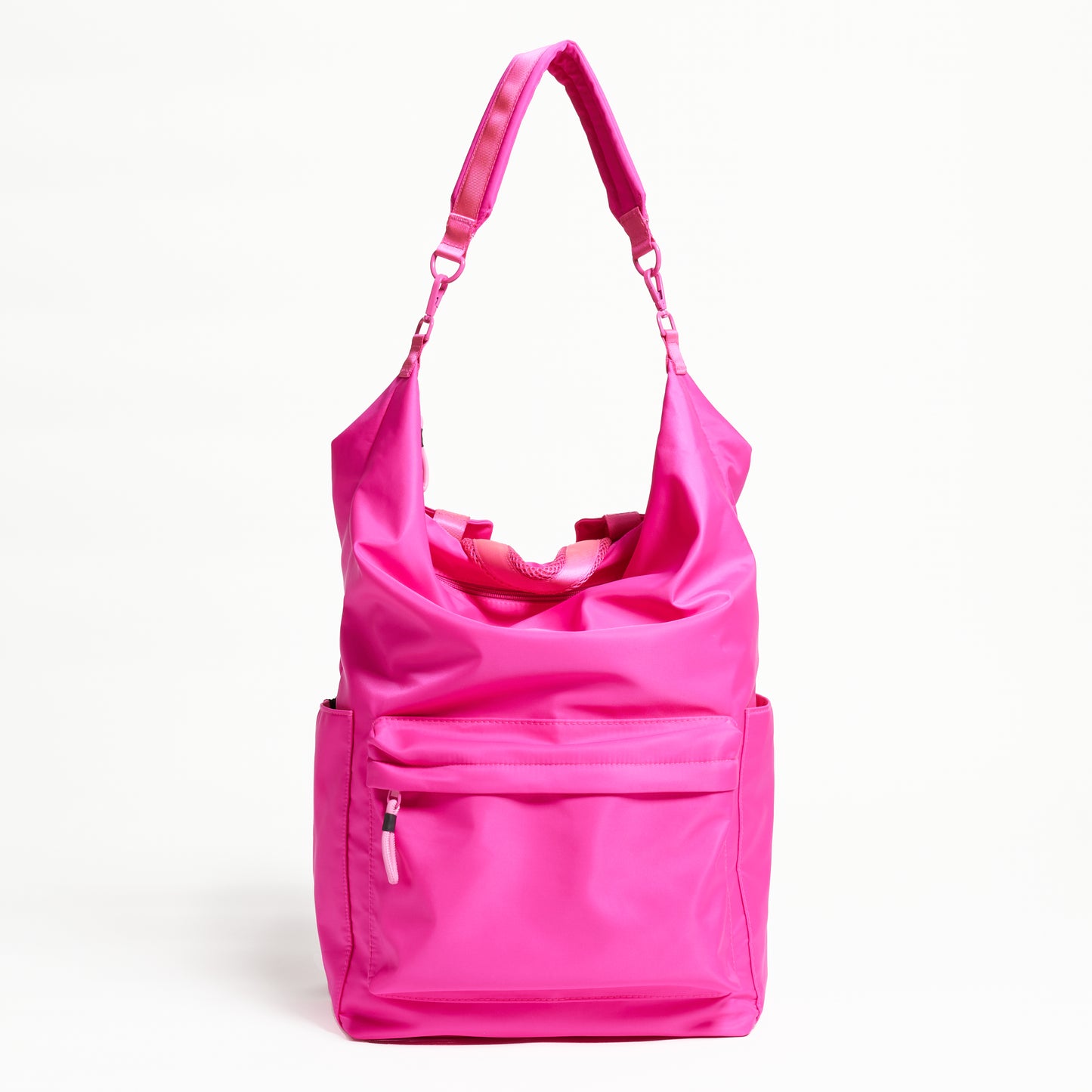 Practice The Karma Backpack in Dragonfruit hot pink color shoulder strap extended