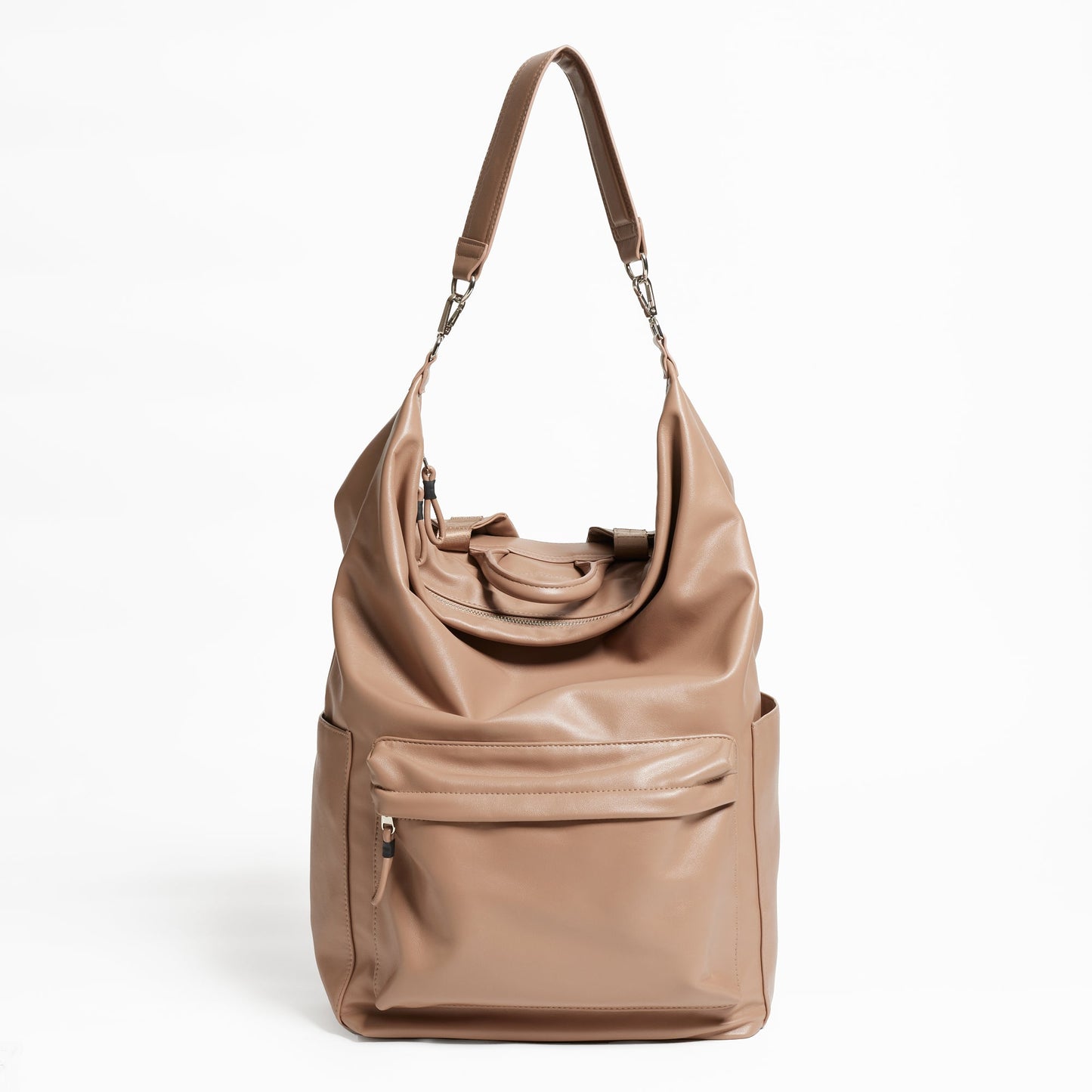 Front Facing view of the Karma Backpack in Mushroom colored Vegan Leather. Backpack has a top handle and a convertible strap to carry your backpack as a tote for easy grab and go!