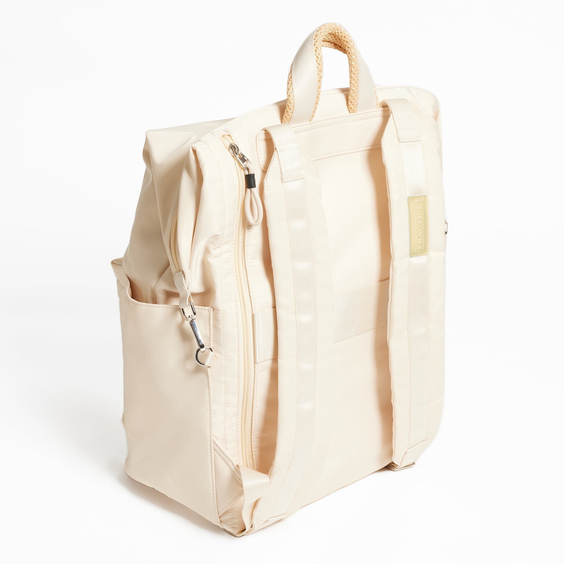 Karma Backpack in Tofu, backside view of laptop case zipper and 2 shoulder straps